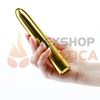 Vibrador rigido dorado con velocidades variables